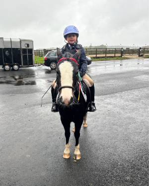 Riding High: A Golden First Place in Dressage!